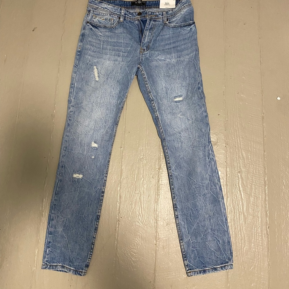 Forever 21 Mid rise slim taper blue jeans